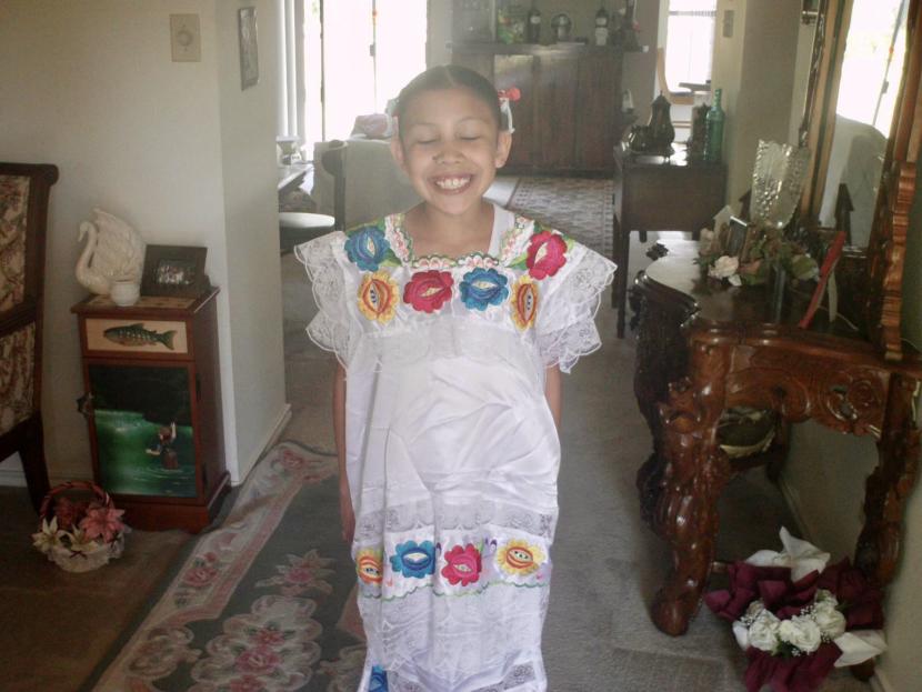 Citlali Gonzalez Trujillo Rios as a child dressed in traditional clothing